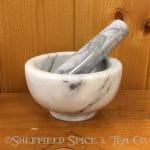 large white marble mortar and pestle