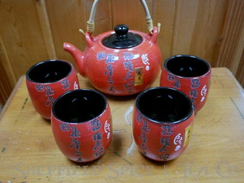 red black asian tea set