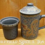 yixing clay mug with strainer dragon print dark brown